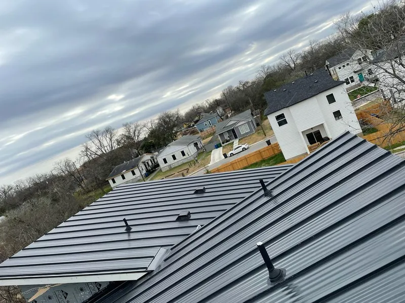 Standing seam metal roof panels with vents for Skylight Repair in Travis Ranch